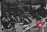 Image of U.S. sailors test fire hose on an LST Portland England United Kingdom, 1944, second 48 stock footage video 65675051842