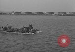 Image of U.S. sailors test fire hose on an LST Portland England United Kingdom, 1944, second 54 stock footage video 65675051842