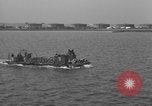 Image of U.S. sailors test fire hose on an LST Portland England United Kingdom, 1944, second 55 stock footage video 65675051842