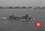 Image of U.S. sailors test fire hose on an LST Portland England United Kingdom, 1944, second 57 stock footage video 65675051842