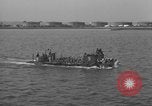 Image of U.S. sailors test fire hose on an LST Portland England United Kingdom, 1944, second 58 stock footage video 65675051842