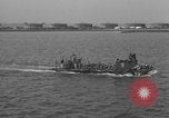 Image of U.S. sailors test fire hose on an LST Portland England United Kingdom, 1944, second 60 stock footage video 65675051842