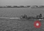 Image of U.S. sailors test fire hose on an LST Portland England United Kingdom, 1944, second 62 stock footage video 65675051842
