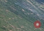 Image of grassy fields Vietnam, 1967, second 23 stock footage video 65675051860