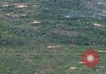 Image of grassy fields Vietnam, 1967, second 26 stock footage video 65675051860