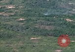Image of grassy fields Vietnam, 1967, second 27 stock footage video 65675051860
