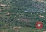 Image of grassy fields Vietnam, 1967, second 28 stock footage video 65675051860