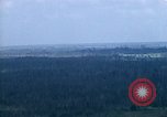 Image of grassy fields Vietnam, 1967, second 37 stock footage video 65675051860