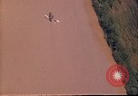 Image of canal Vietnam, 1967, second 49 stock footage video 65675051864