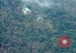 Image of smoky jungle Vietnam, 1967, second 11 stock footage video 65675051865