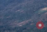 Image of smoky jungle Vietnam, 1967, second 47 stock footage video 65675051865