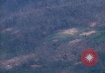 Image of smoky jungle Vietnam, 1967, second 49 stock footage video 65675051865