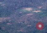 Image of smoky jungle Vietnam, 1967, second 51 stock footage video 65675051865