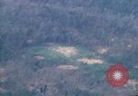 Image of smoky jungle Vietnam, 1967, second 53 stock footage video 65675051865