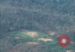 Image of smoky jungle Vietnam, 1967, second 54 stock footage video 65675051865