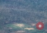 Image of smoky jungle Vietnam, 1967, second 55 stock footage video 65675051865