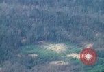 Image of smoky jungle Vietnam, 1967, second 57 stock footage video 65675051865
