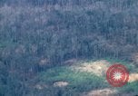 Image of smoky jungle Vietnam, 1967, second 60 stock footage video 65675051865