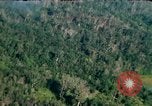 Image of wooded low land Vietnam, 1967, second 7 stock footage video 65675051866