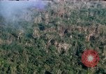 Image of wooded low land Vietnam, 1967, second 11 stock footage video 65675051866