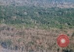 Image of wooded low land Vietnam, 1967, second 24 stock footage video 65675051866
