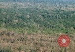 Image of wooded low land Vietnam, 1967, second 25 stock footage video 65675051866