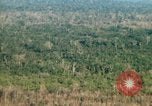 Image of wooded low land Vietnam, 1967, second 27 stock footage video 65675051866