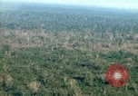 Image of wooded low land Vietnam, 1967, second 32 stock footage video 65675051866