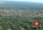 Image of wooded low land Vietnam, 1967, second 33 stock footage video 65675051866