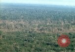 Image of wooded low land Vietnam, 1967, second 34 stock footage video 65675051866