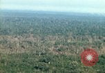 Image of wooded low land Vietnam, 1967, second 35 stock footage video 65675051866