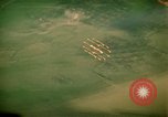 Image of grassy area Vietnam, 1967, second 13 stock footage video 65675051871