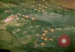 Image of grassy area Vietnam, 1967, second 18 stock footage video 65675051871