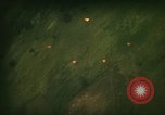 Image of grassy area Vietnam, 1967, second 23 stock footage video 65675051872