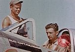 Image of P-47 pilots and crew chiefs of USAAC 57th Fighter Group Corsica France, 1944, second 3 stock footage video 65675051884