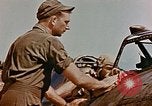 Image of P-47 pilots and crew chiefs of USAAC 57th Fighter Group Corsica France, 1944, second 35 stock footage video 65675051884