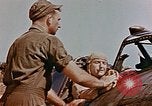 Image of P-47 pilots and crew chiefs of USAAC 57th Fighter Group Corsica France, 1944, second 39 stock footage video 65675051884