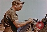Image of P-47 pilots and crew chiefs of USAAC 57th Fighter Group Corsica France, 1944, second 50 stock footage video 65675051884