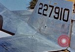 Image of Pilot examines flak damage to his P-47 aircraft Corsica France, 1944, second 33 stock footage video 65675051897