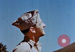 Image of Pilot examines flak damage to his P-47 aircraft Corsica France, 1944, second 40 stock footage video 65675051897