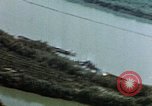 Image of barge in canal Italy, 1944, second 31 stock footage video 65675051898