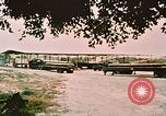 Image of loading bombs on B-52 aircraft in Vietnam War Guam, 1967, second 3 stock footage video 65675051905