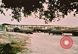 Image of loading bombs on B-52 aircraft in Vietnam War Guam, 1967, second 4 stock footage video 65675051905