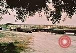 Image of loading bombs on B-52 aircraft in Vietnam War Guam, 1967, second 7 stock footage video 65675051905