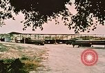Image of loading bombs on B-52 aircraft in Vietnam War Guam, 1967, second 8 stock footage video 65675051905