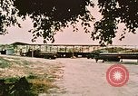 Image of loading bombs on B-52 aircraft in Vietnam War Guam, 1967, second 9 stock footage video 65675051905