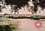Image of loading bombs on B-52 aircraft in Vietnam War Guam, 1967, second 10 stock footage video 65675051905