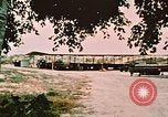 Image of loading bombs on B-52 aircraft in Vietnam War Guam, 1967, second 14 stock footage video 65675051905
