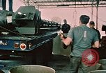 Image of loading bombs on B-52 aircraft in Vietnam War Guam, 1967, second 15 stock footage video 65675051905
