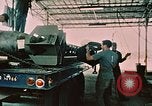 Image of loading bombs on B-52 aircraft in Vietnam War Guam, 1967, second 17 stock footage video 65675051905